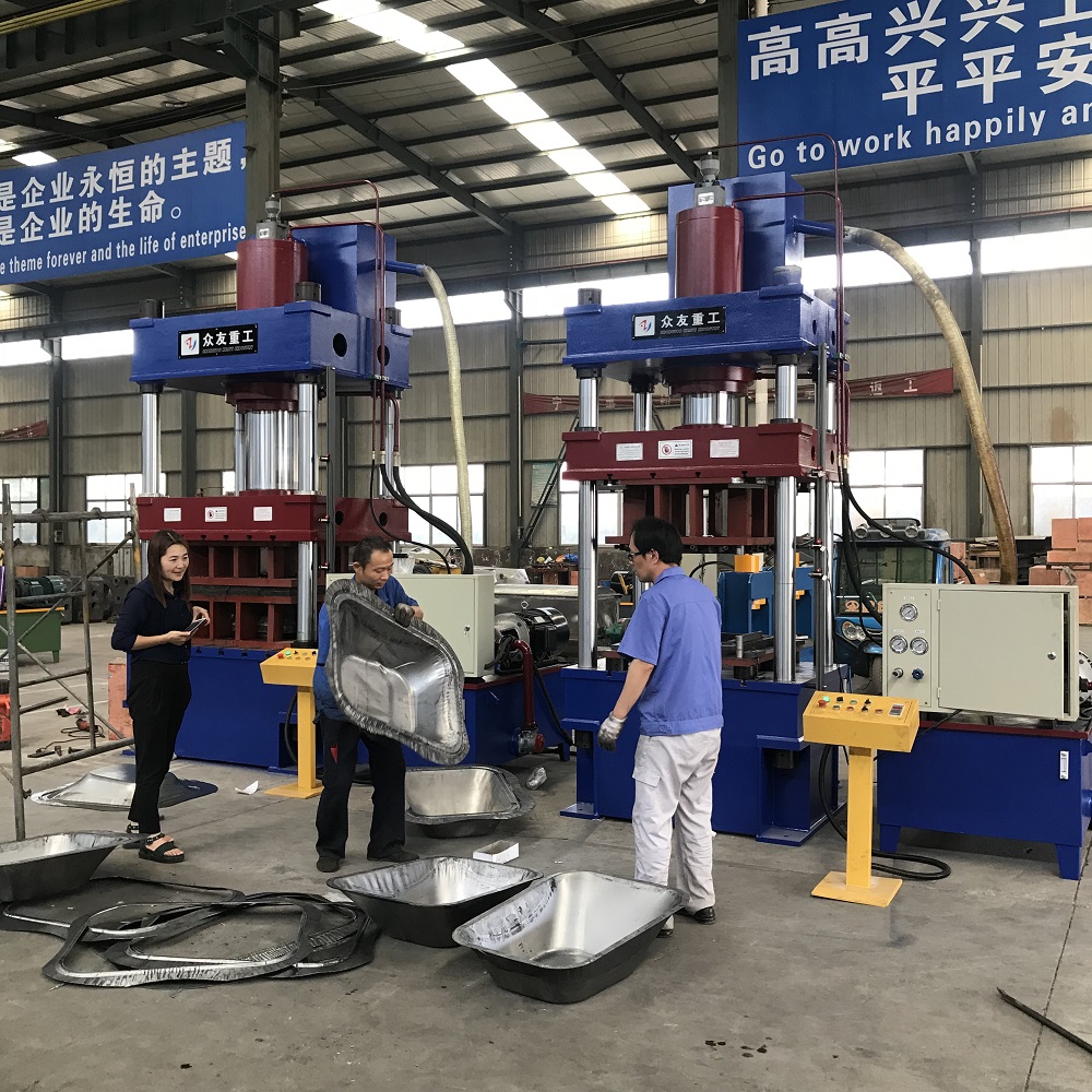 315噸(dun)灰鬭(dou)車拉伸(shen)切(qie)邊三樑(liang)四(si)柱(zhu)液壓機