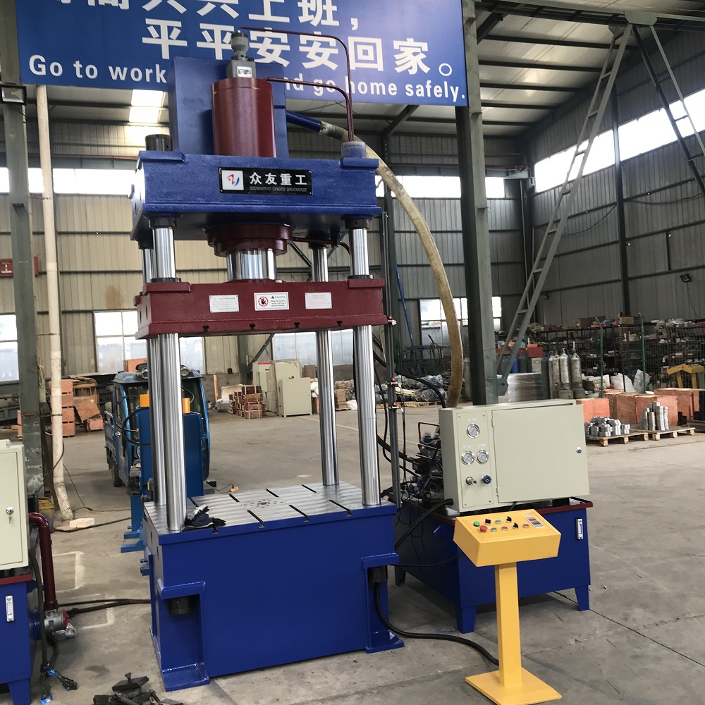 315噸(dun)三(san)樑(liang)四柱灰鬭車拉伸成(cheng)型切邊液(ye)壓機(ji)